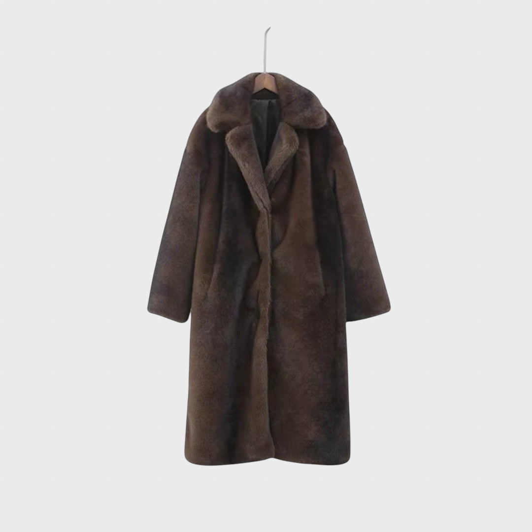 Pūkūtė | Long faux leather coat